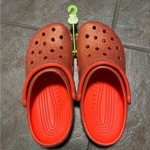 NWT CROCS orange glitter clogs